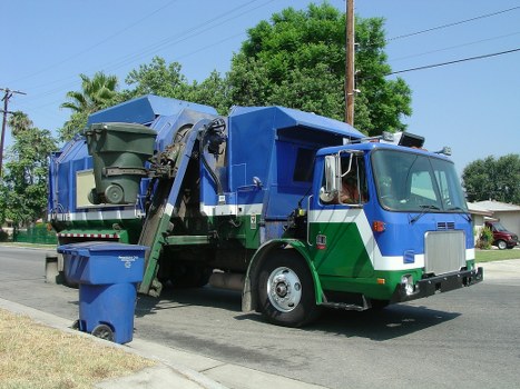 Enclosed and lockable skip parked in a residential area of Cricklewood