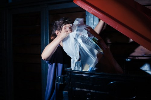 Workers handling demolition waste in Cricklewood